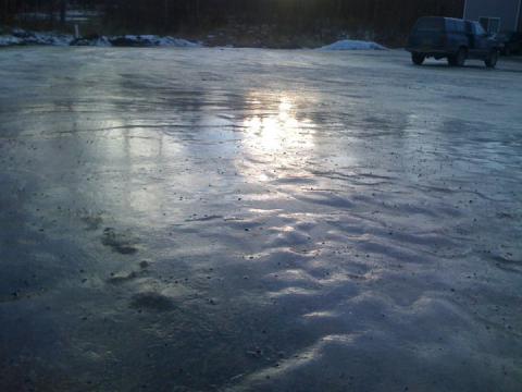 A thick layer of ice in the parking lot, Wasilla, Alaska