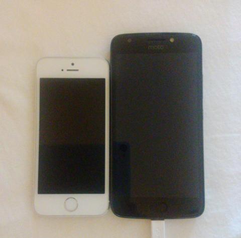 iPhone 5S next to a Moto E